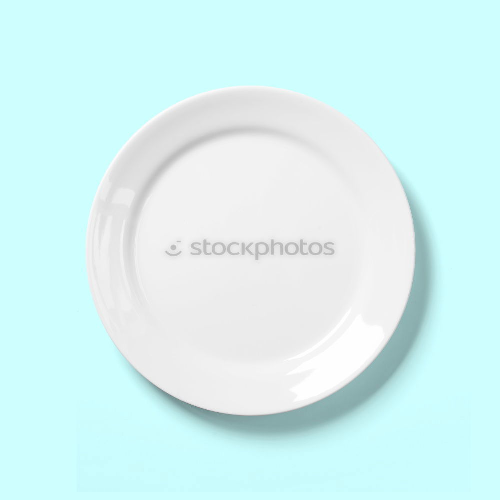 Similar – Empty plate on blue wood background