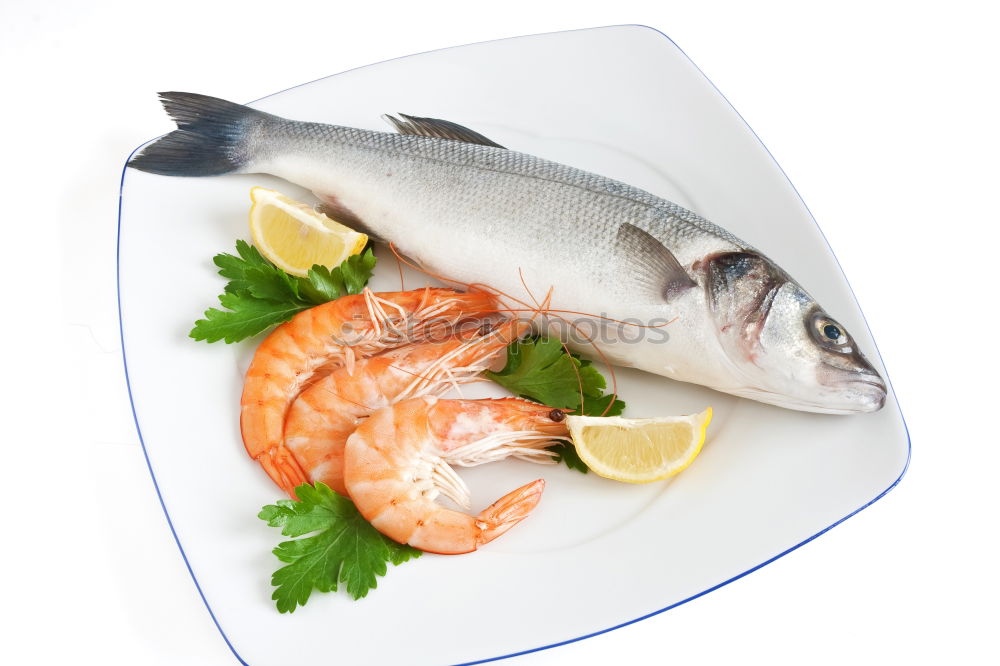 Similar – Prepare fresh fish with lemon and oil