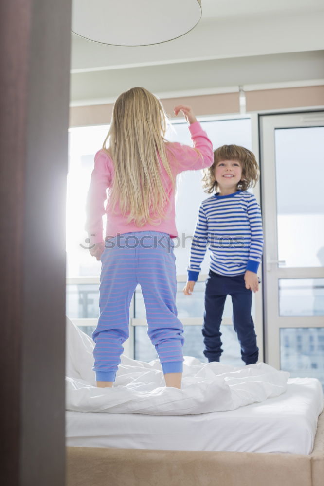 Similar – Portrait of two happy children sitting on the stairs