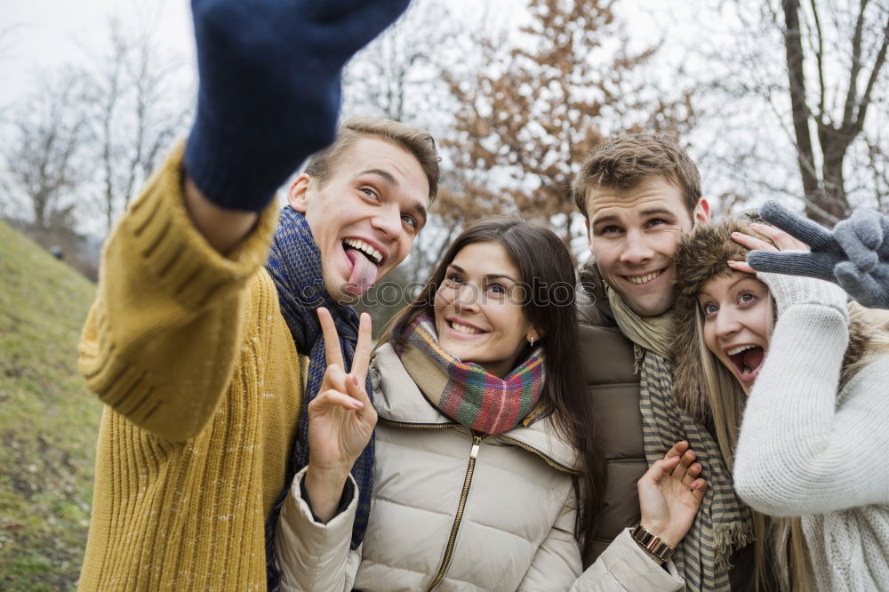 Similar – Group of friends taking selfie in urban park