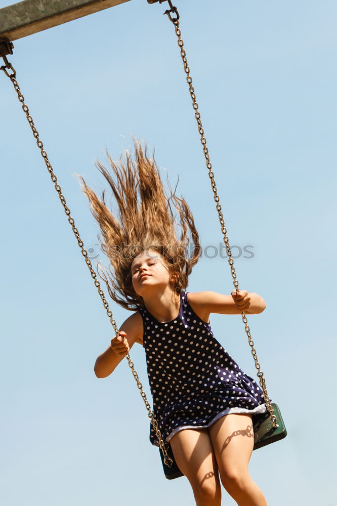 Similar – Little girl jumping on trampoline