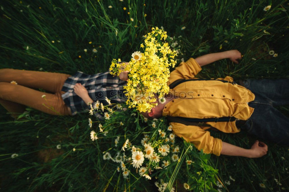 Similar – Barfuß im kühlem feuchten Gras mit Gänseblümchen