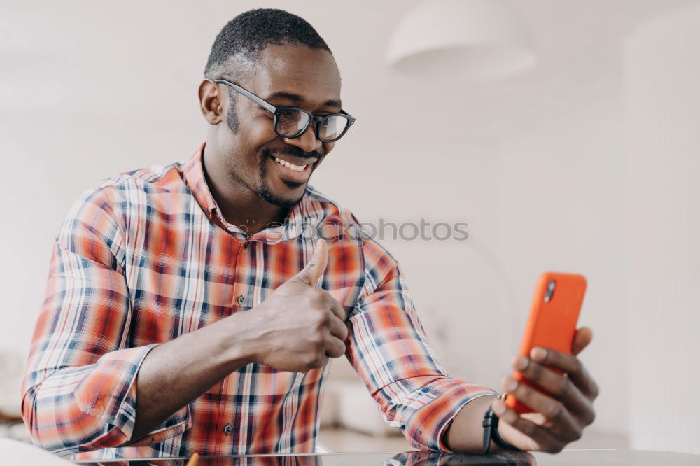 Similar – Image, Stock Photo American man using mobile in the street.