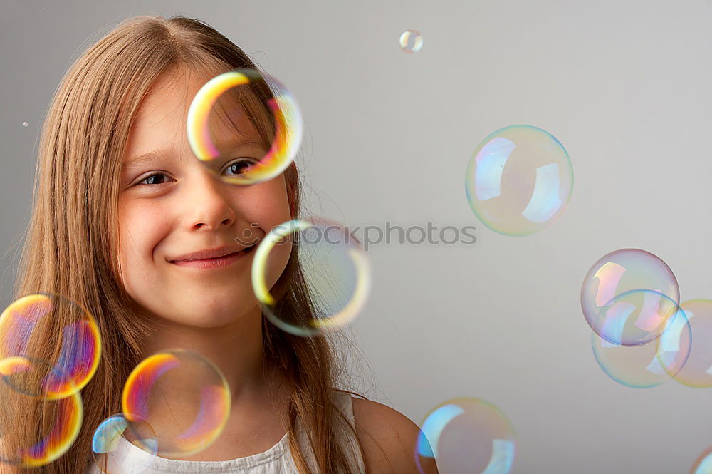 Image, Stock Photo Girl blowing balloon outside