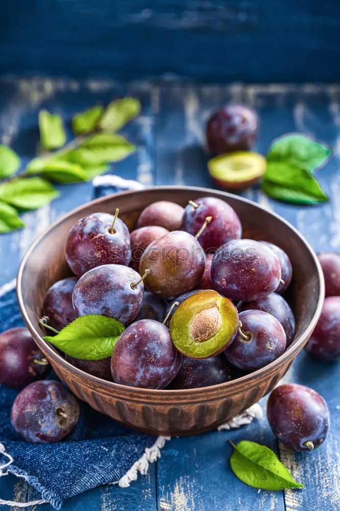 Similar – Image, Stock Photo Fresh plums with leaves