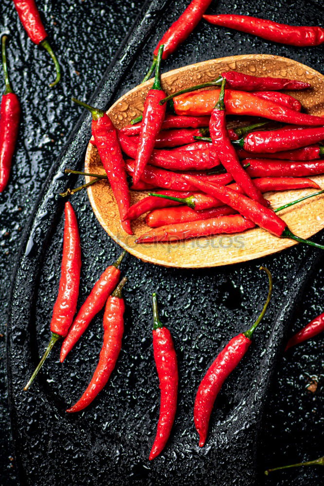 Similar – Image, Stock Photo Fresh red and spicy chilli peppers