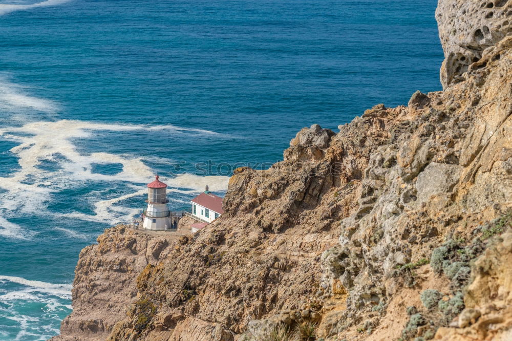 Similar – Wunderschöner Leuchtturm auf den hohen Klippen des Saint Vincent Kaps in der Algarve, Portugal