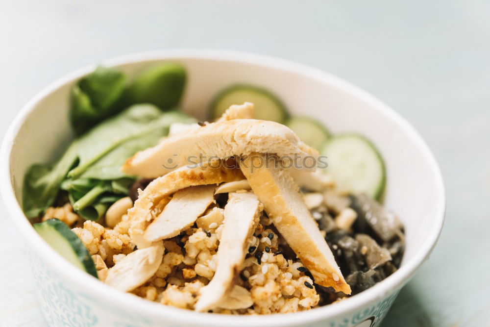 Similar – Image, Stock Photo Smoothie mango bowl with chia seeds yogurt pudding and cranberries, nuts, oatmeal topping in coconut shells with spoon. Healthy clean breakfast food. Copy space for your text or design