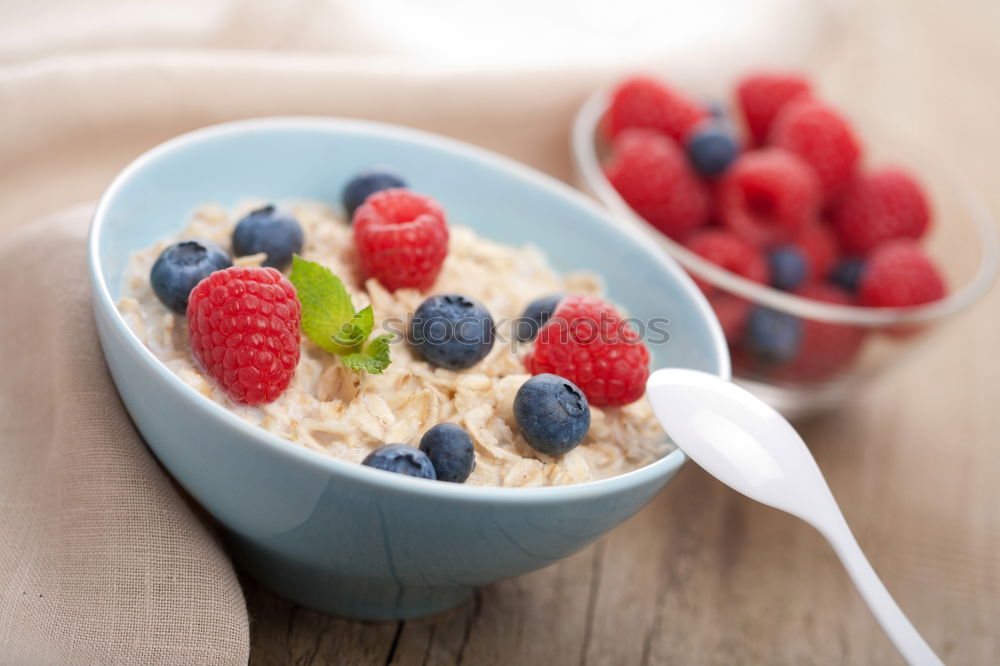 Similar – Image, Stock Photo Muesli with yoghurt and fruits on wood