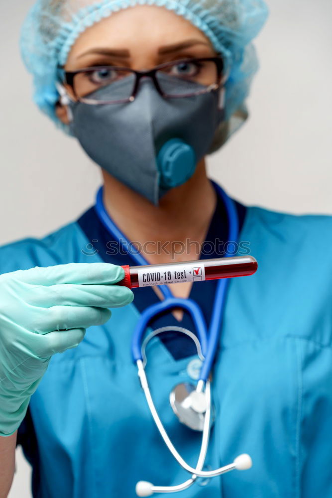 Similar – Foto Bild Konzentrierte Chirurgin bei der Arbeit