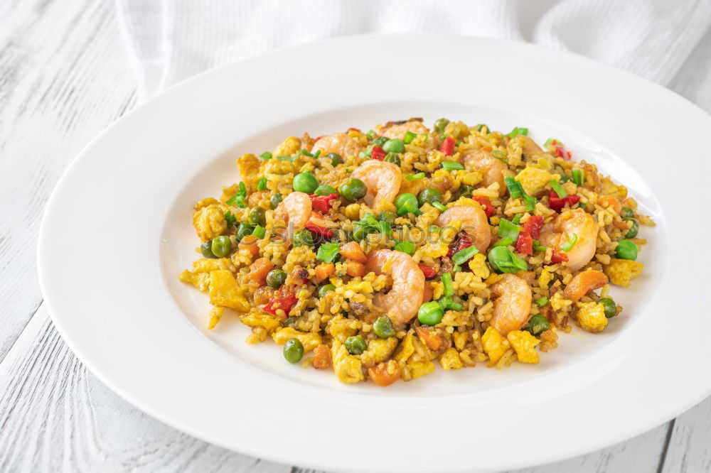 Similar – Image, Stock Photo Risotto with vegetables on a wooden table