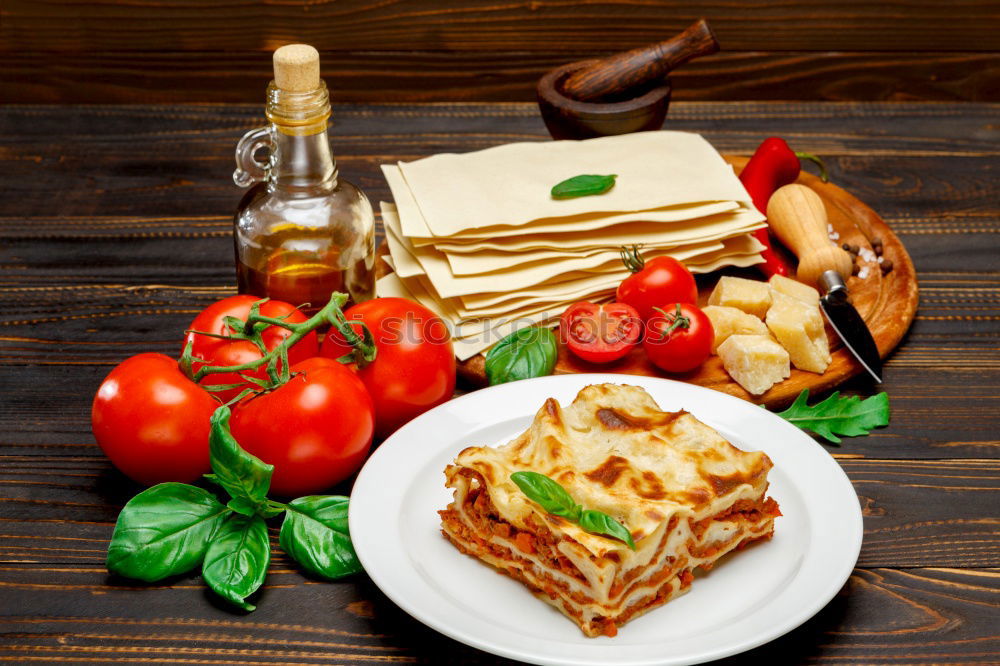 Similar – Whole wheat pasta, basil, tomatoes and garlic