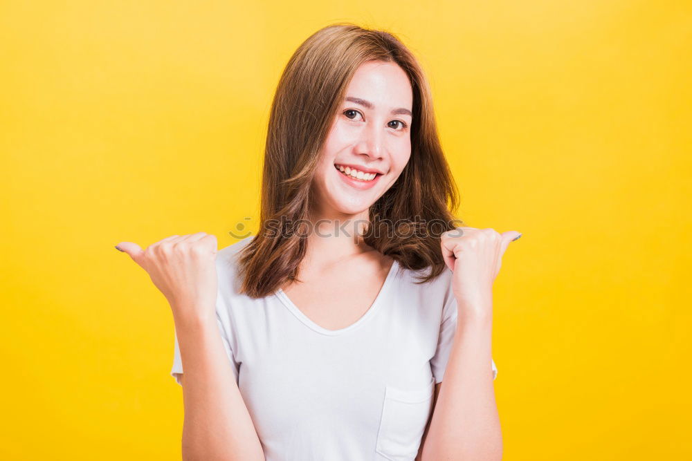 Similar – Image, Stock Photo Portrait of beautiful young woman using mobile phone in the street.