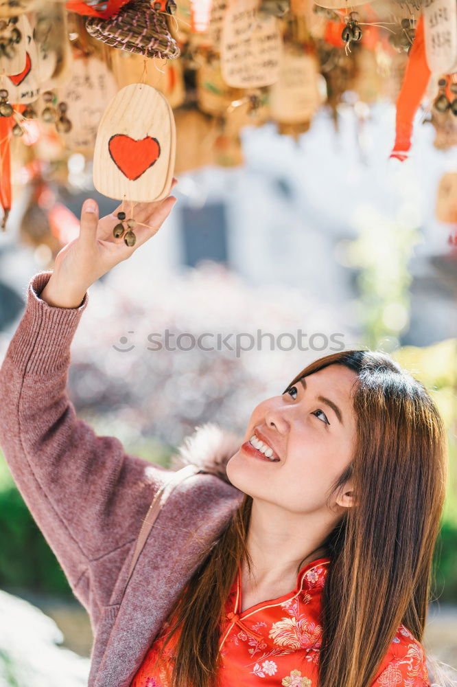 Similar – Image, Stock Photo young happy girl eating caramel apple, walking at christmas city