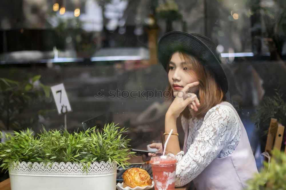 Similar – Crop woman eating sushi