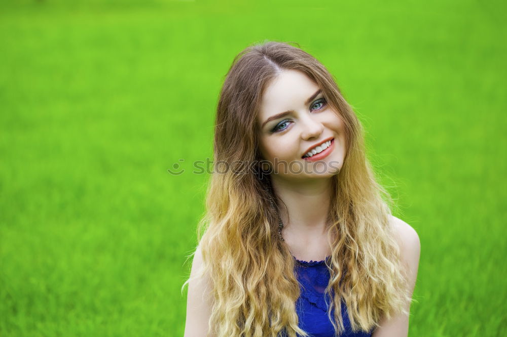 Similar – Pretty happy woman with red long hair