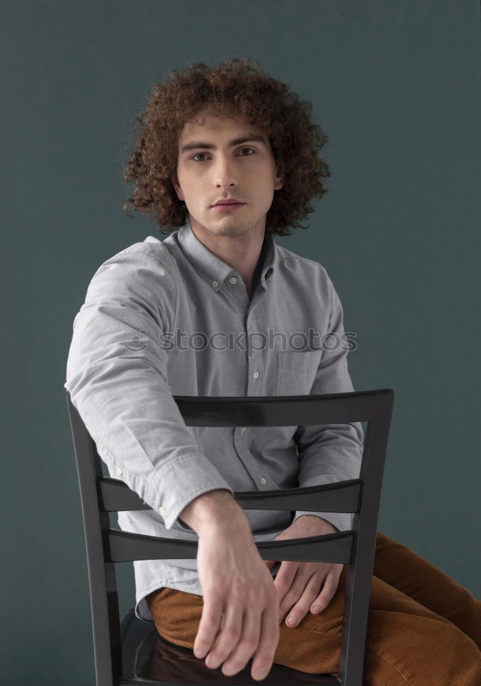 Similar – Image, Stock Photo Portrait of a stylish young handsome long-haired unshaven man