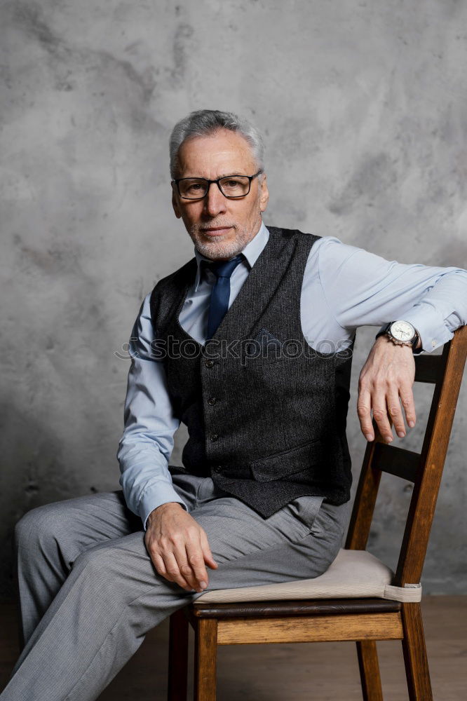 Similar – Image, Stock Photo Senior businessman walking outside of modern office building.