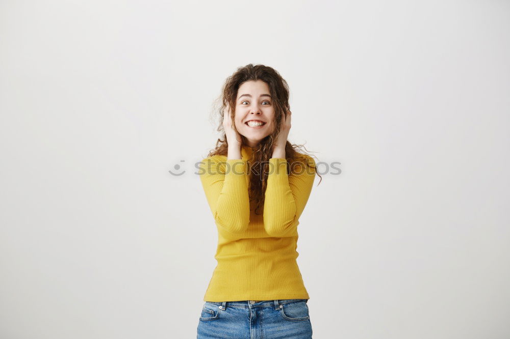 Similar – Who am I? Young woman holding a mirror in front of her face. Faceless, identity not recognizable, the mirror is showing her backhead. Hiding her face.