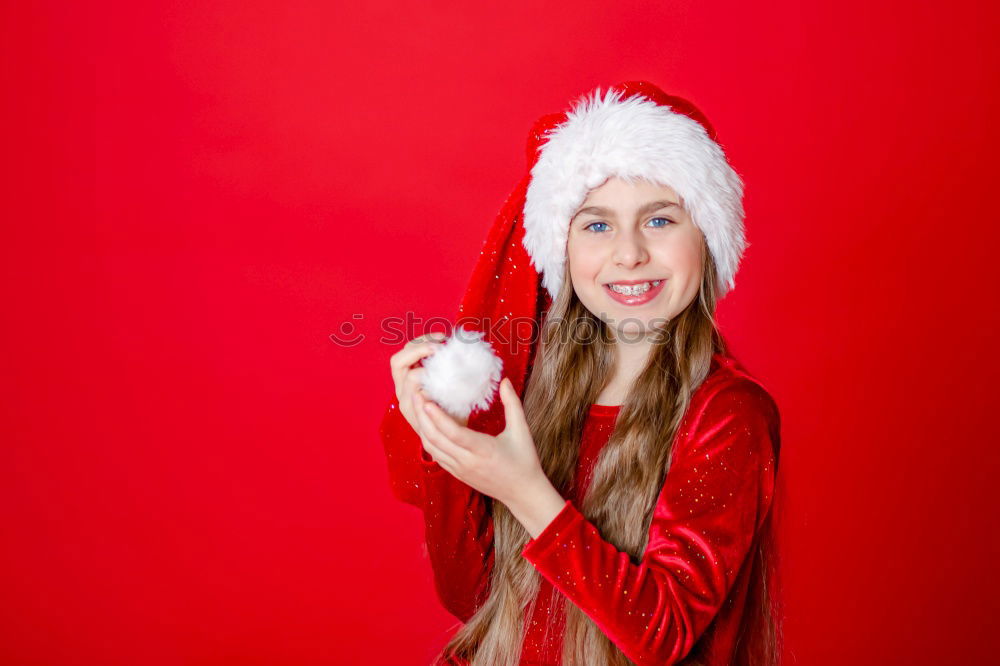 Similar – Brunette woman with red deer wool sweater