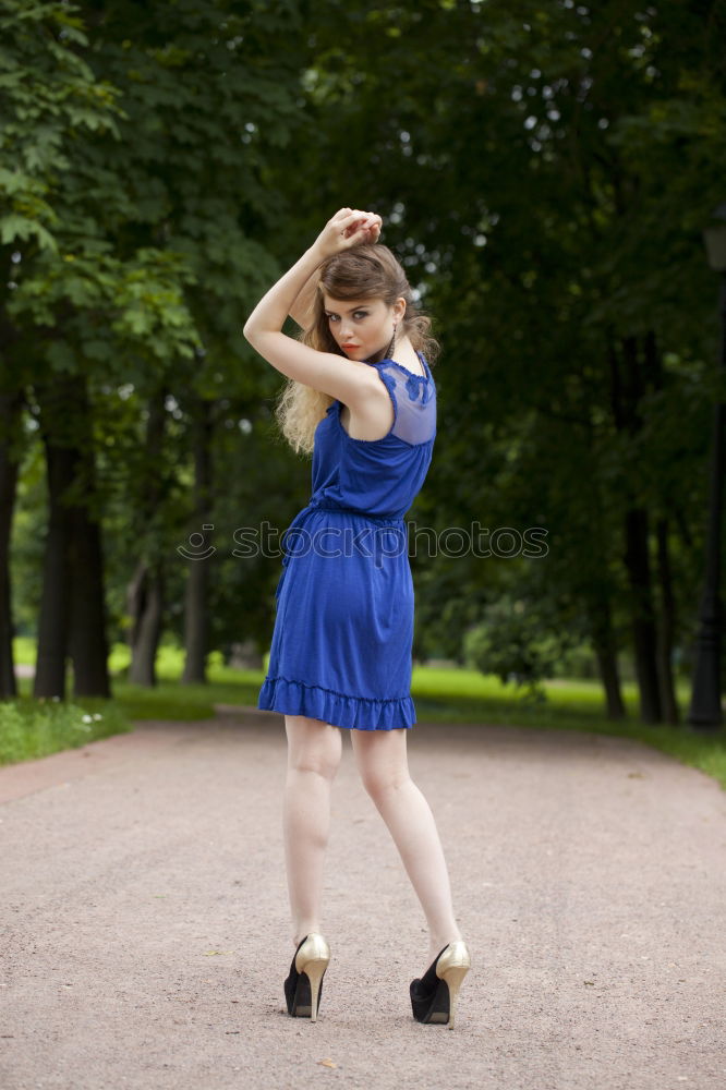 Similar – Image, Stock Photo Young woman in the city