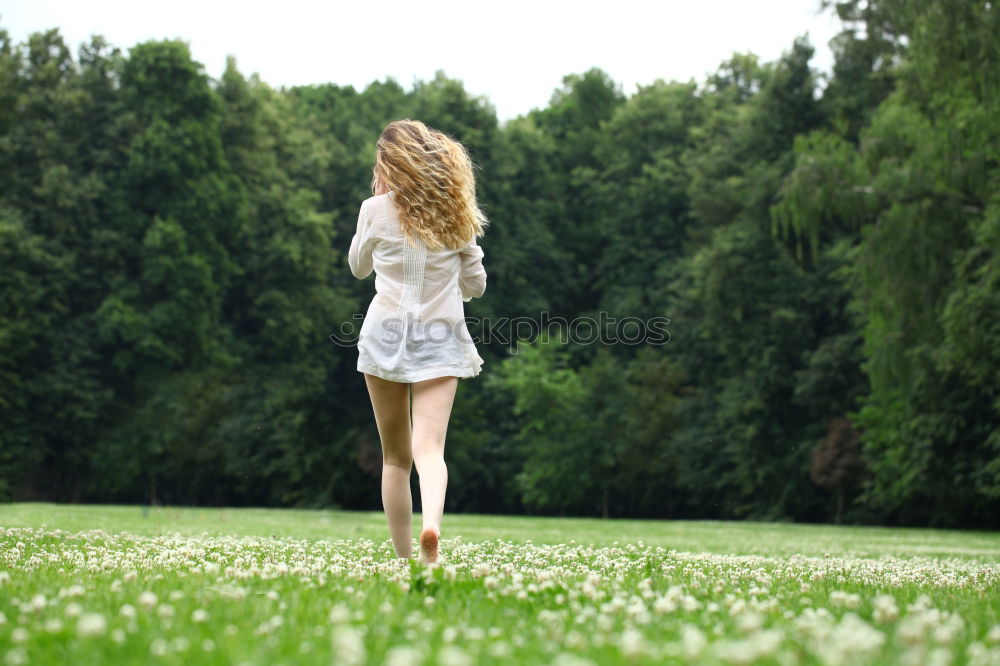 Similar – Image, Stock Photo Woman standing at rural fence