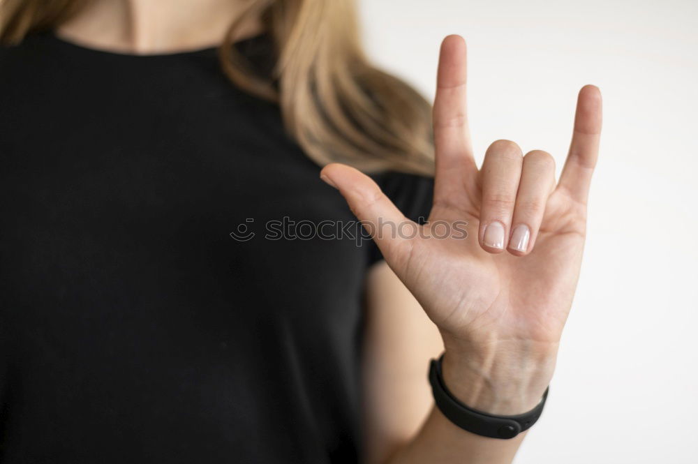 Similar – Image, Stock Photo Young woman with a feminine symbol painted in her hand