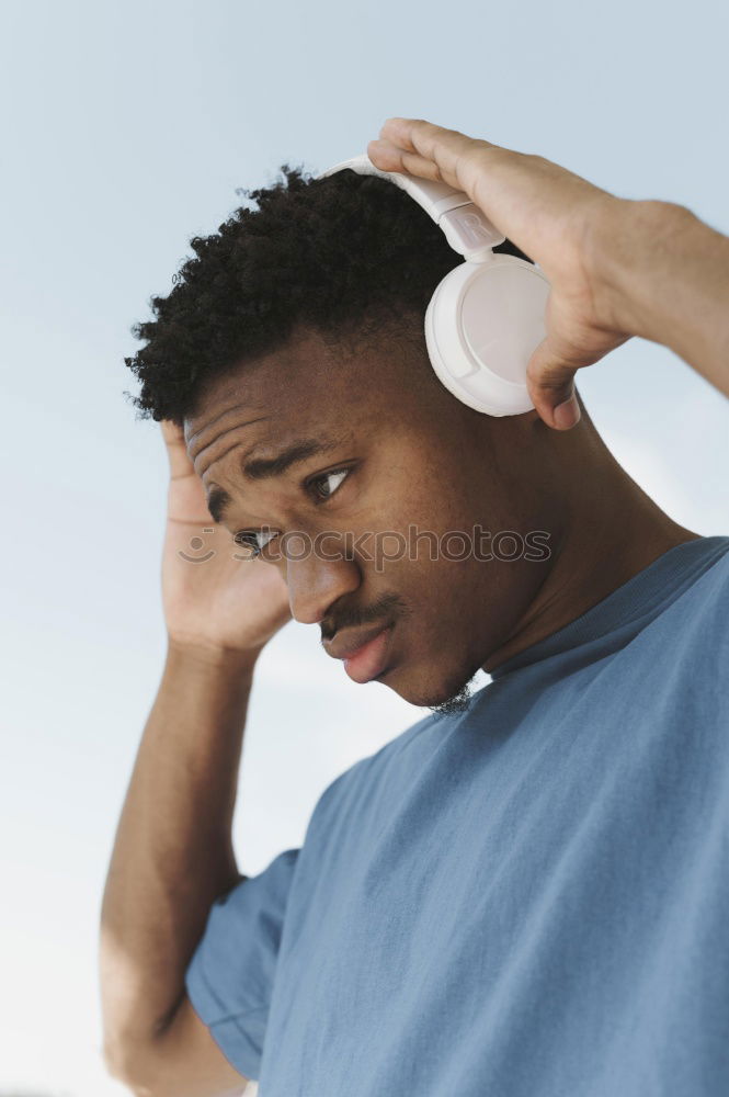 Similar – Image, Stock Photo Young man enjoying sun and music