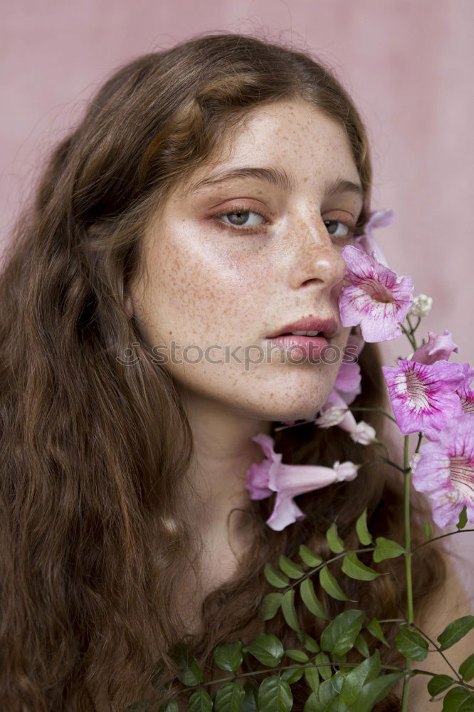 Similar – Image, Stock Photo Lifestyle portrait of happy young adult woman enjoying flowers
