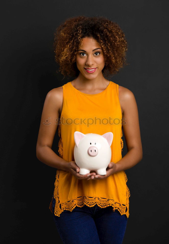 Similar – Image, Stock Photo Black woman with saving piggy bank