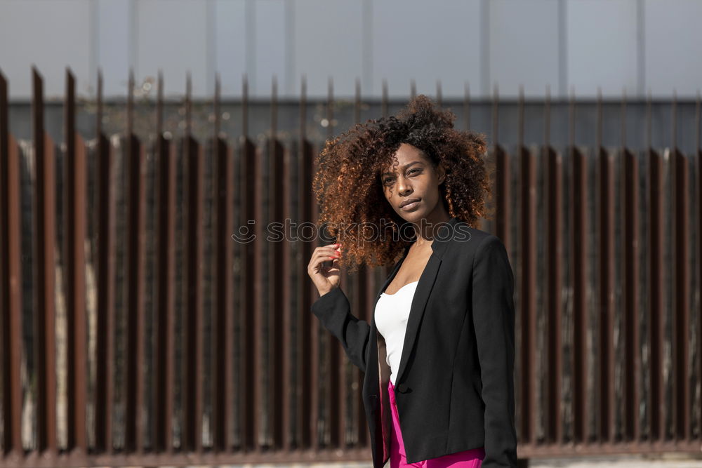 Similar – Smiling young arabic woman with black curly hairstyle