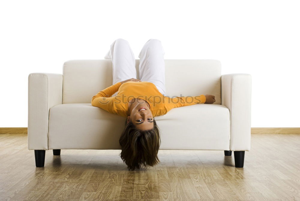 Similar – Image, Stock Photo Feet up. Casual young woman sits barefoot on a comfortable armchair, relaxes, raises her legs. vertical.