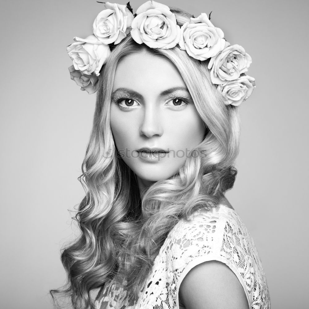 Similar – blonde young woman with flowers in background