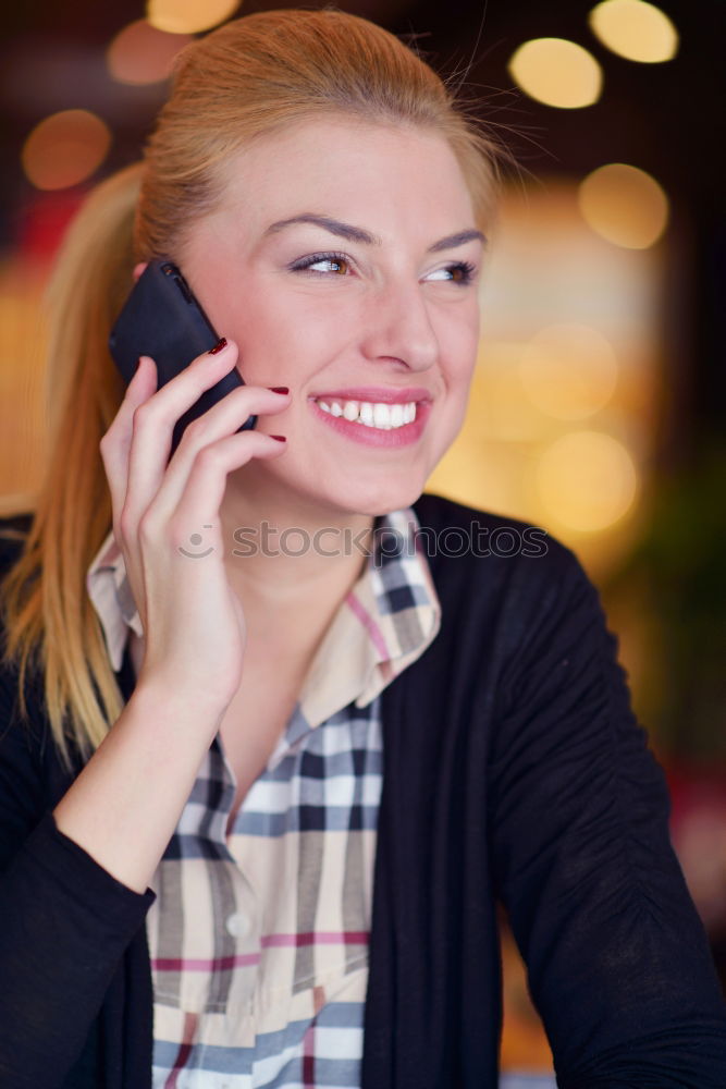 Similar – Smiling Woman in Autumn Fashion Talking on Phone