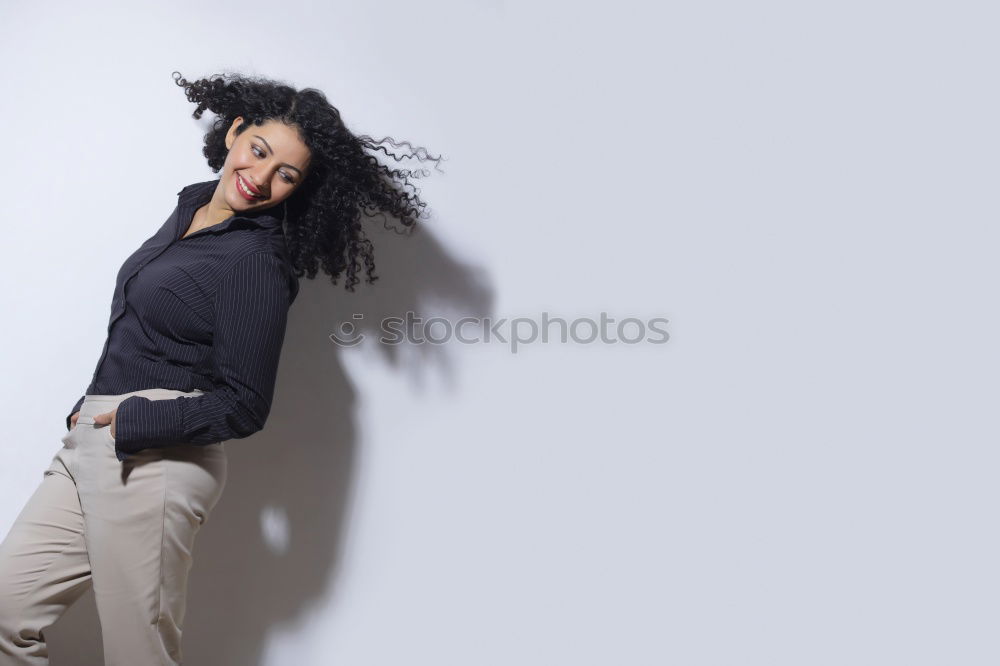 Woman with flying dreadlocks