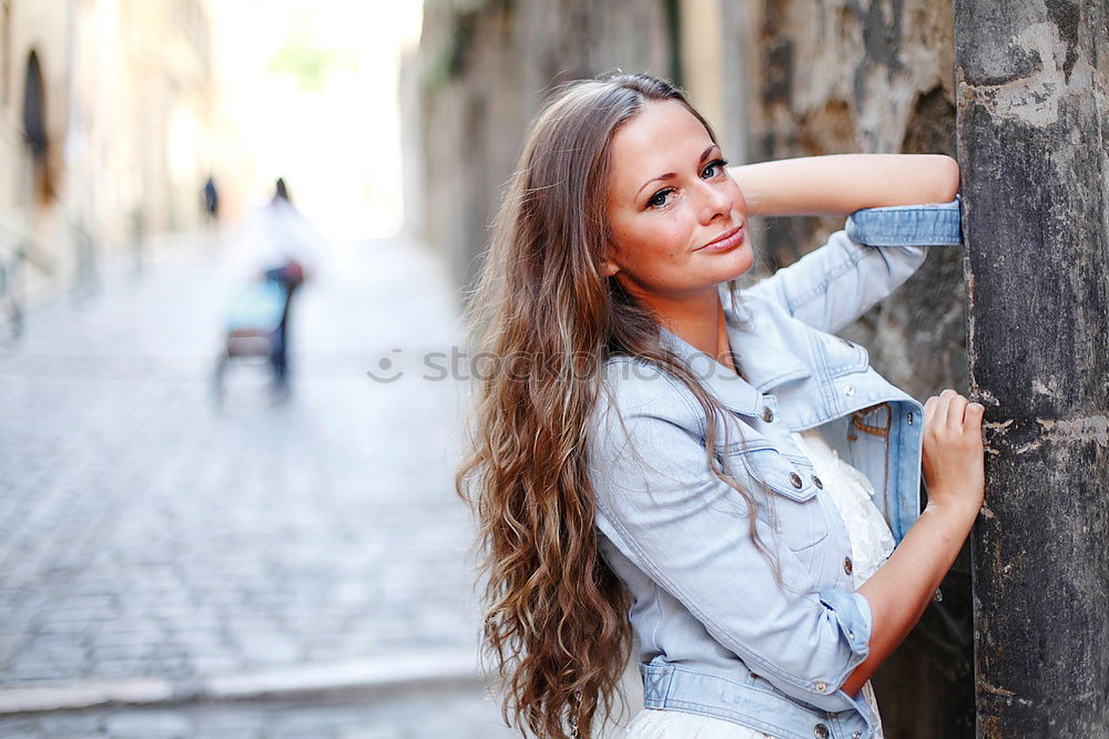 Similar – Image, Stock Photo Beautiful young blonde woman in urban background.