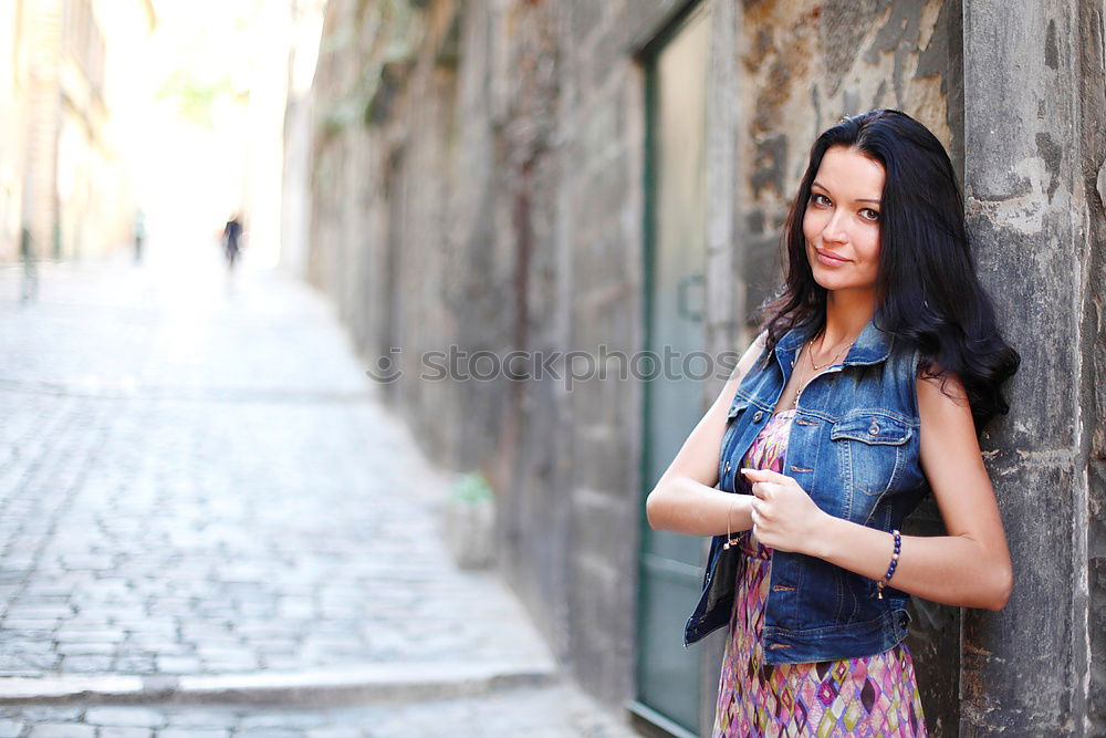 Similar – Mixed woman in urban background wearing casual clothes