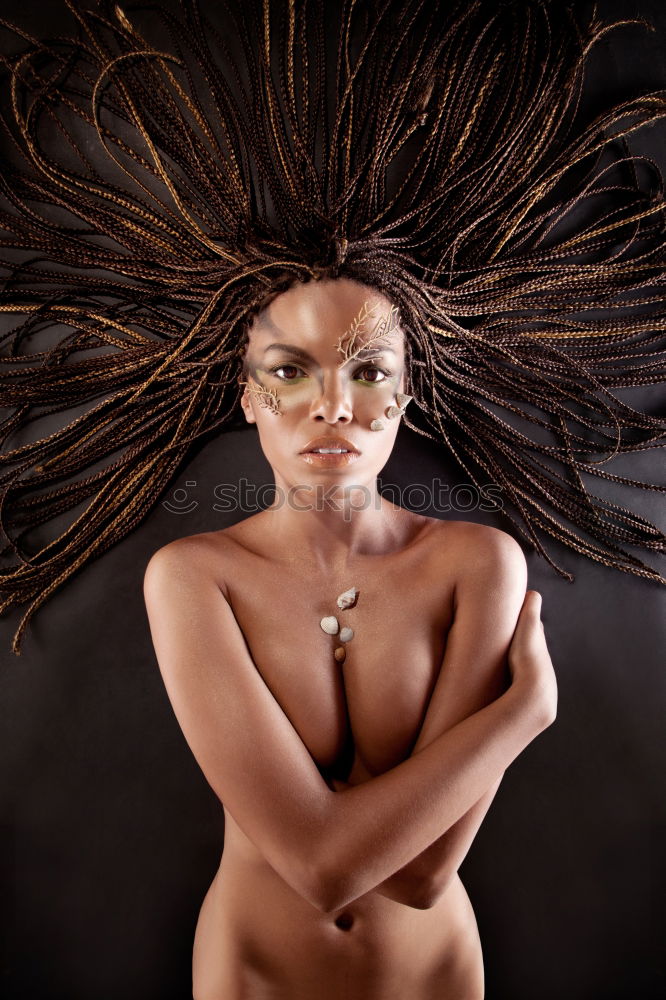 Similar – Black woman with autumn leaf in her hand.