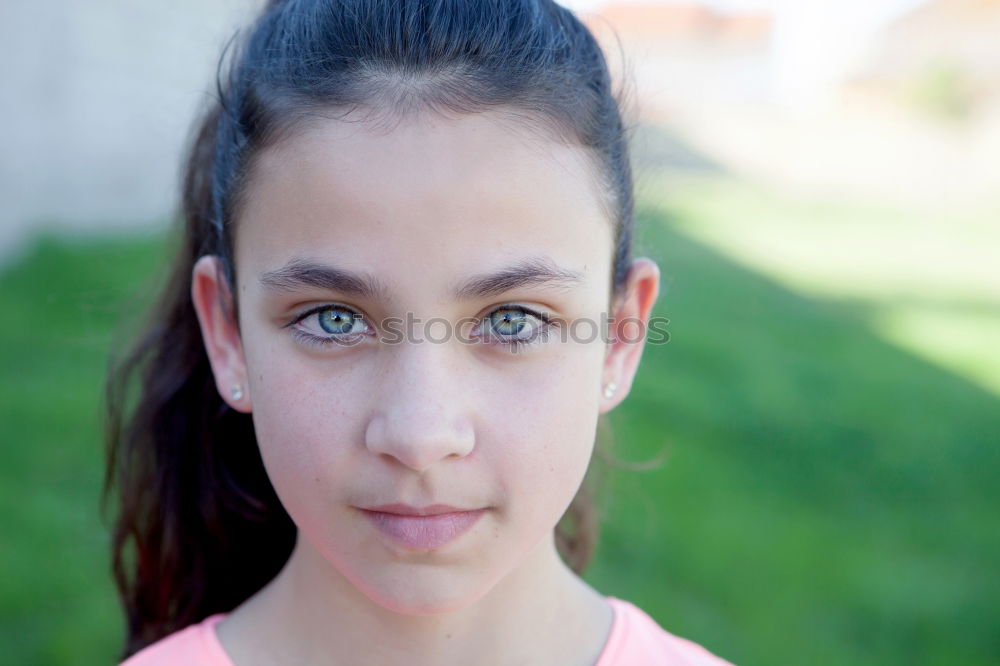 Similar – Happy preteen girl with blue eyes smiling