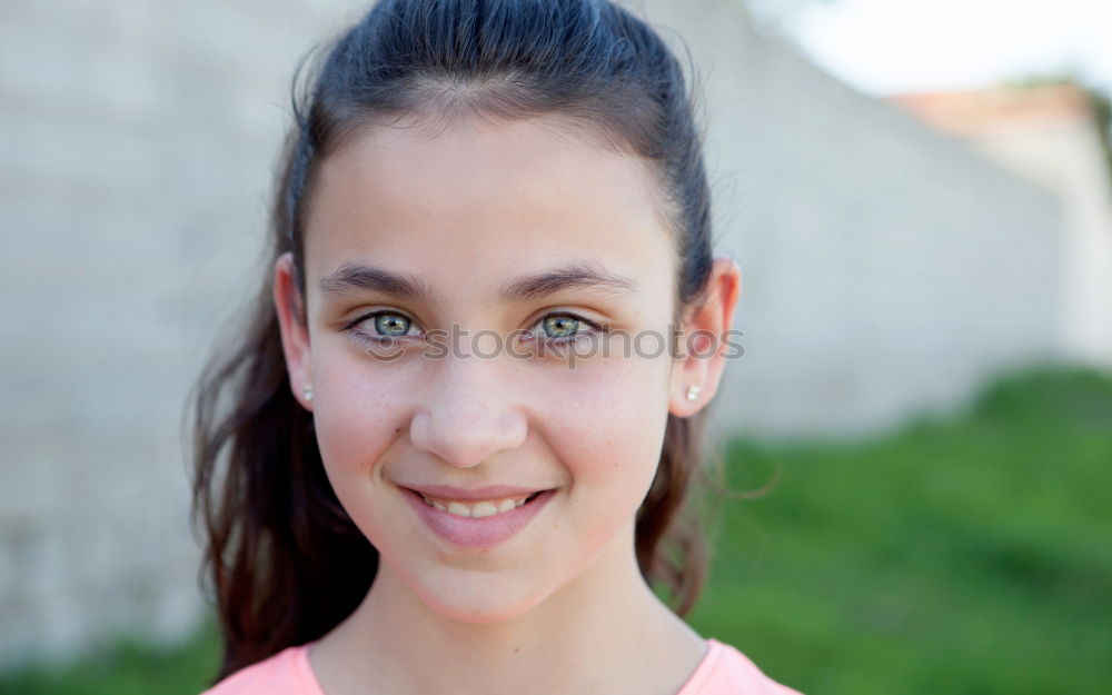 Similar – Happy preteen girl with blue eyes smiling