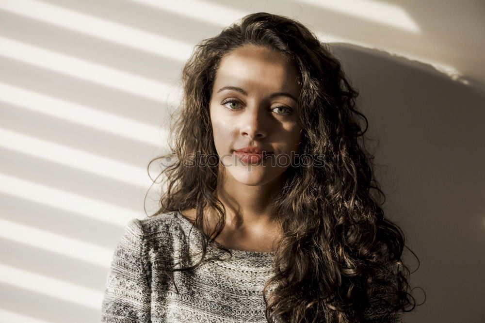 Similar – Image, Stock Photo Portrait of tall beautiful woman with long dark curly hair in nature