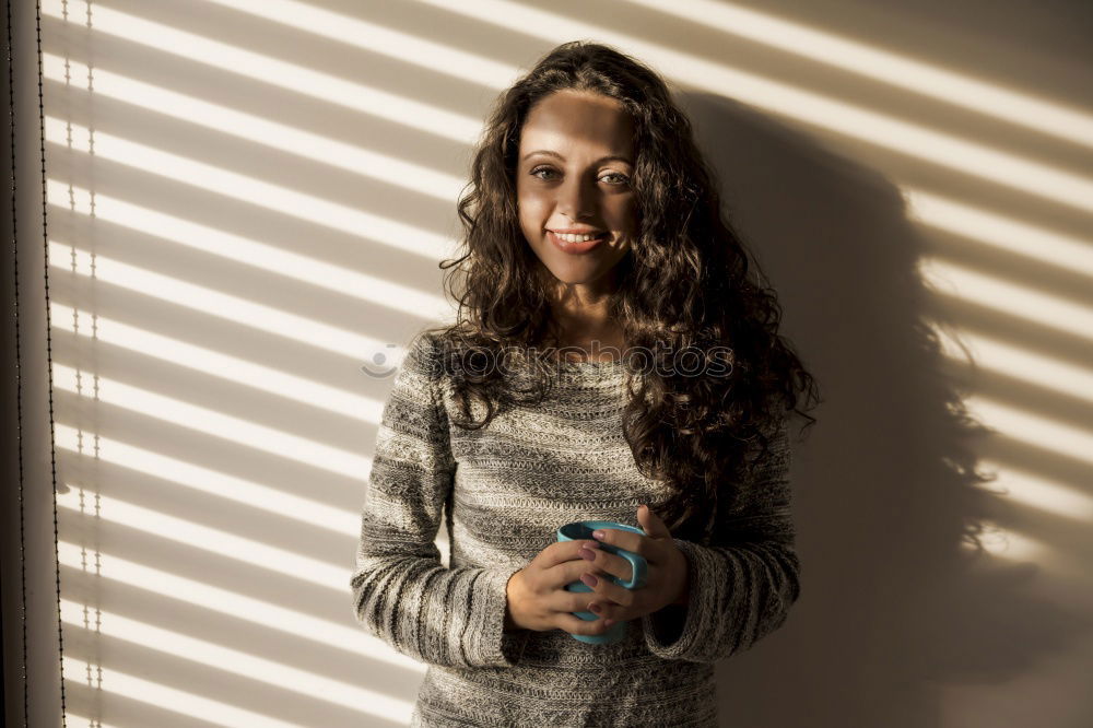 Similar – A young woman listening music on digital tablet