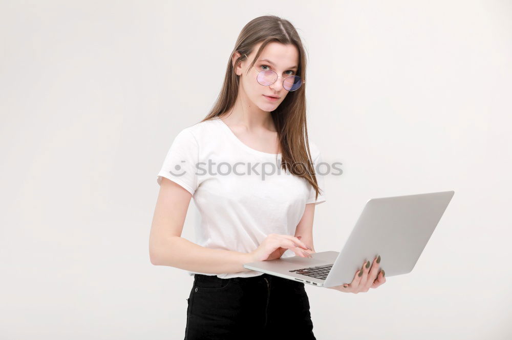 Similar – Image, Stock Photo Happy young woman on the tablet by the wall