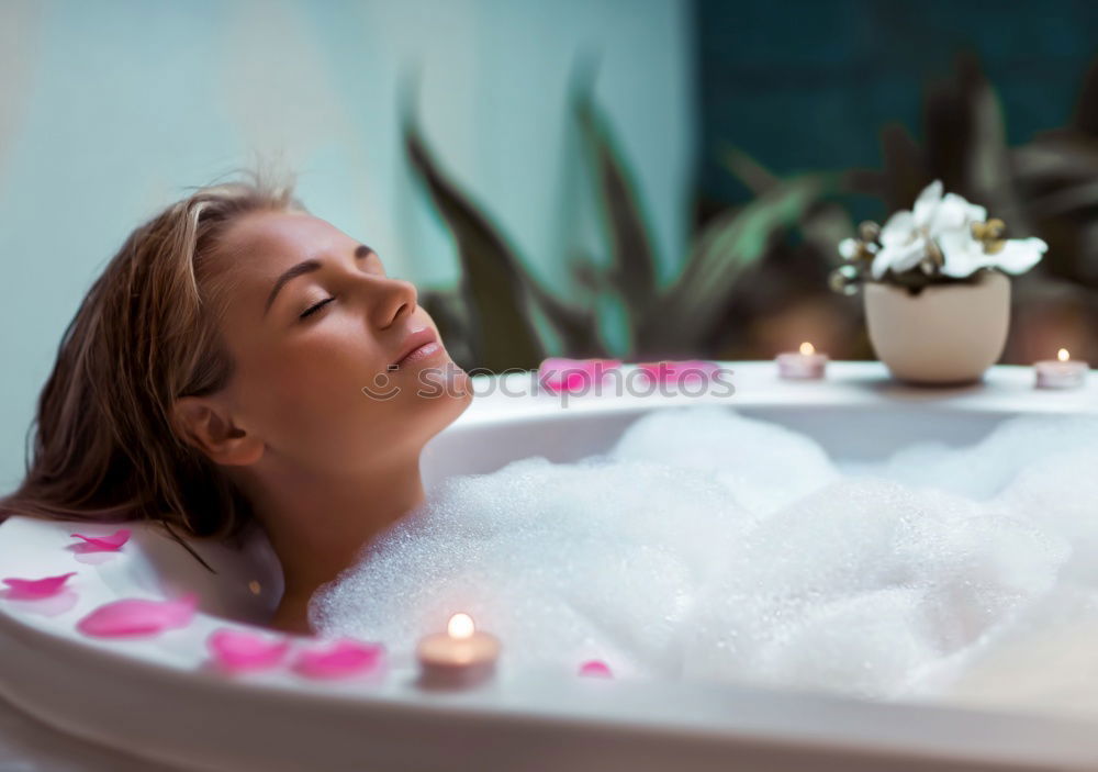 Similar – Woman lying in tub doing hydrotherapy treatment