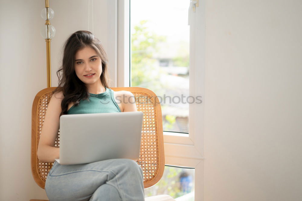 Similar – Mature woman sitting on couch at modern home