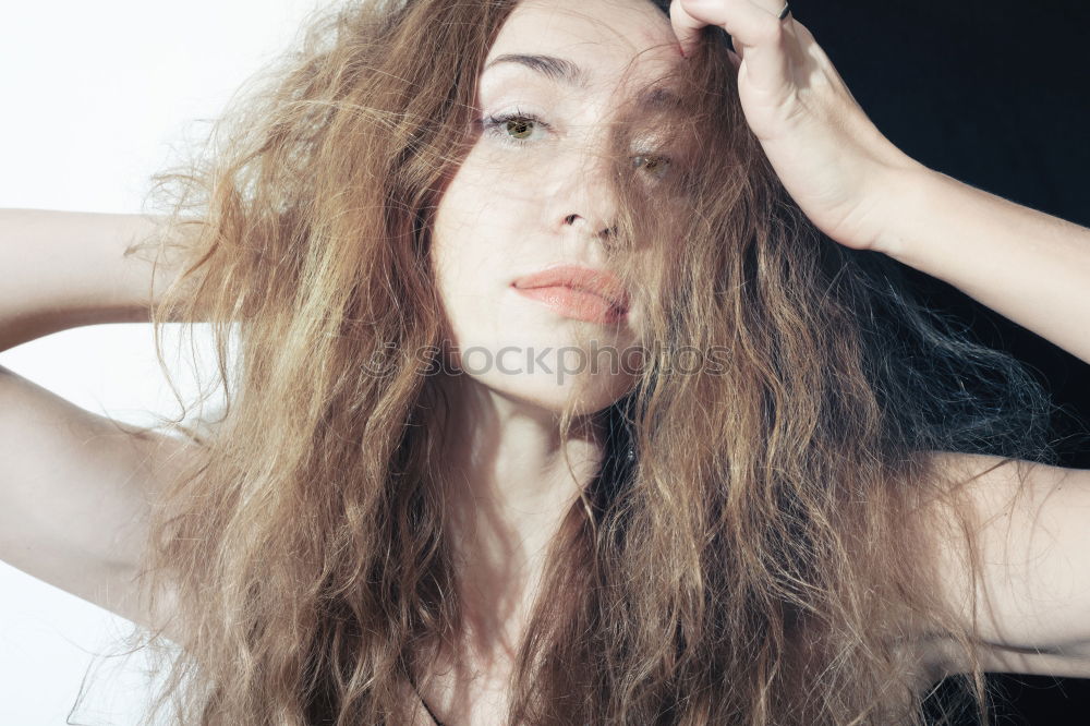 Close-up of the face of a brunette girl with short hair