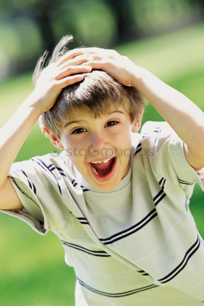 Similar – Smiling boy in the park