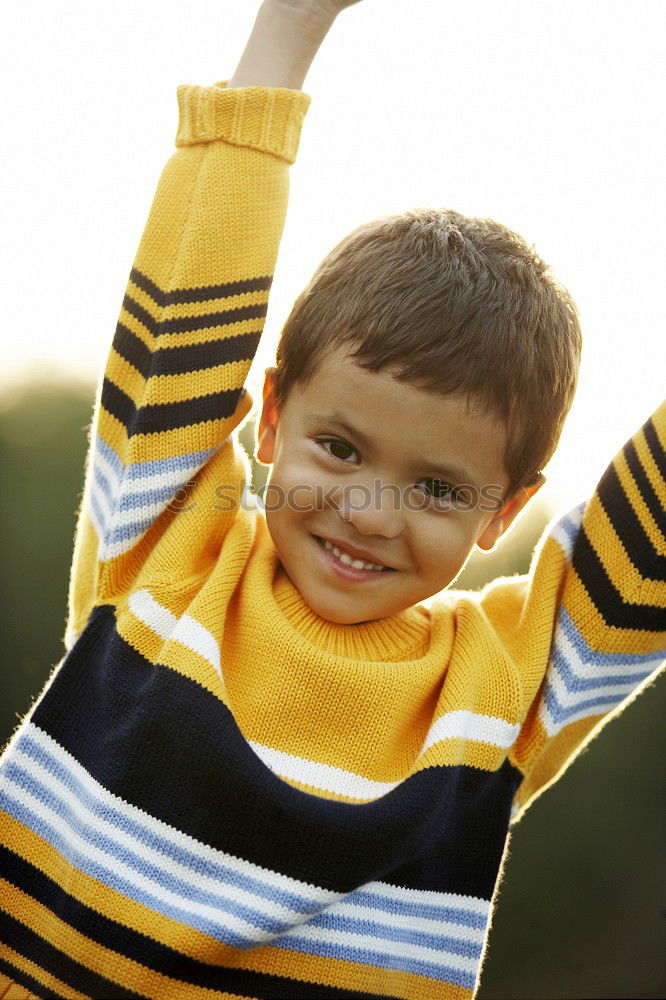 Similar – Image, Stock Photo Cute kid against a yellow tree in autumn