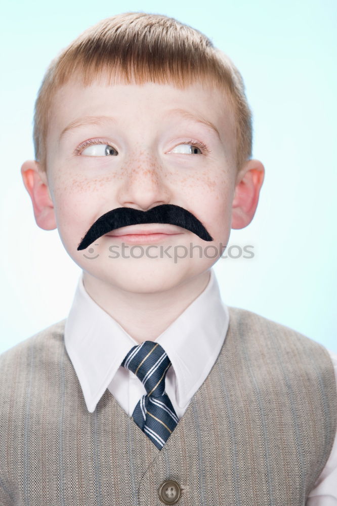 Similar – Funny boy with fake mustache and tie