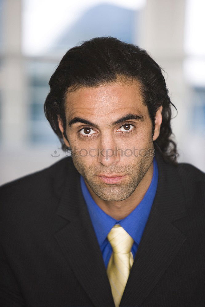 Similar – Businessman wearing blue suit and tie outdoors